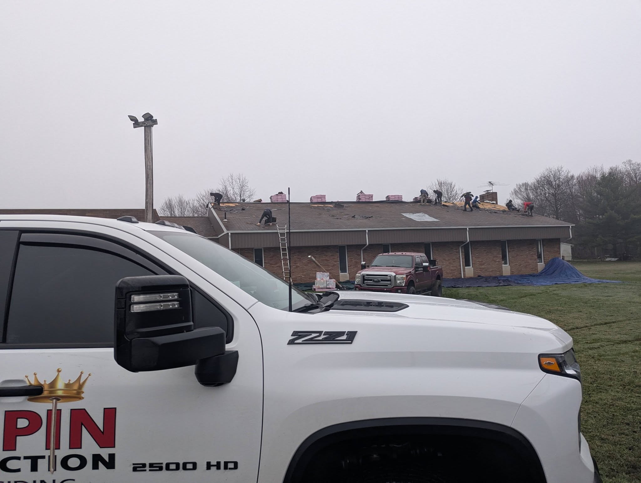 Kingpin Construction crew at work on a Northeast Ohio roof