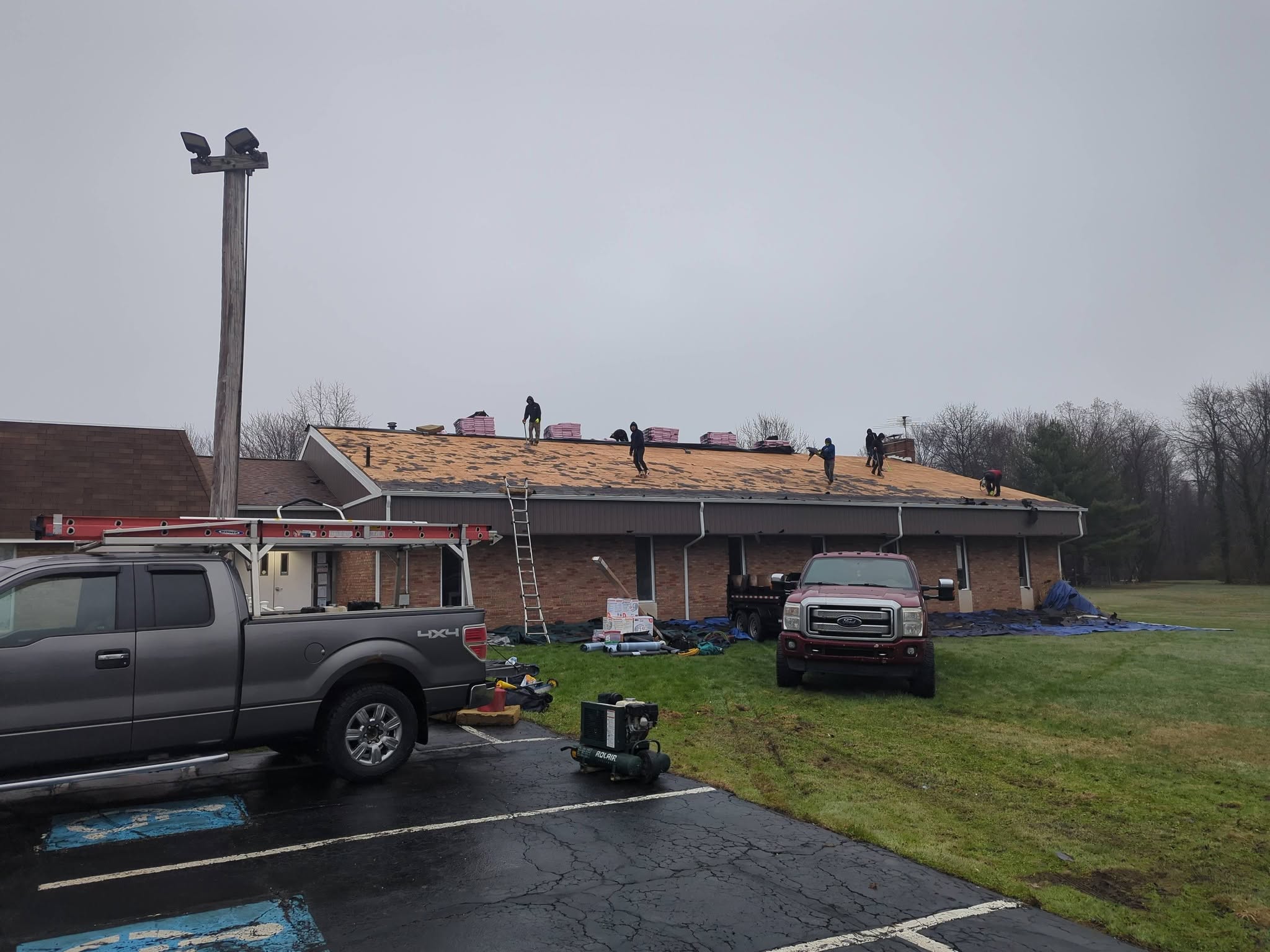 Kingpin crew tearing off a roof in Geauga County, Ohio