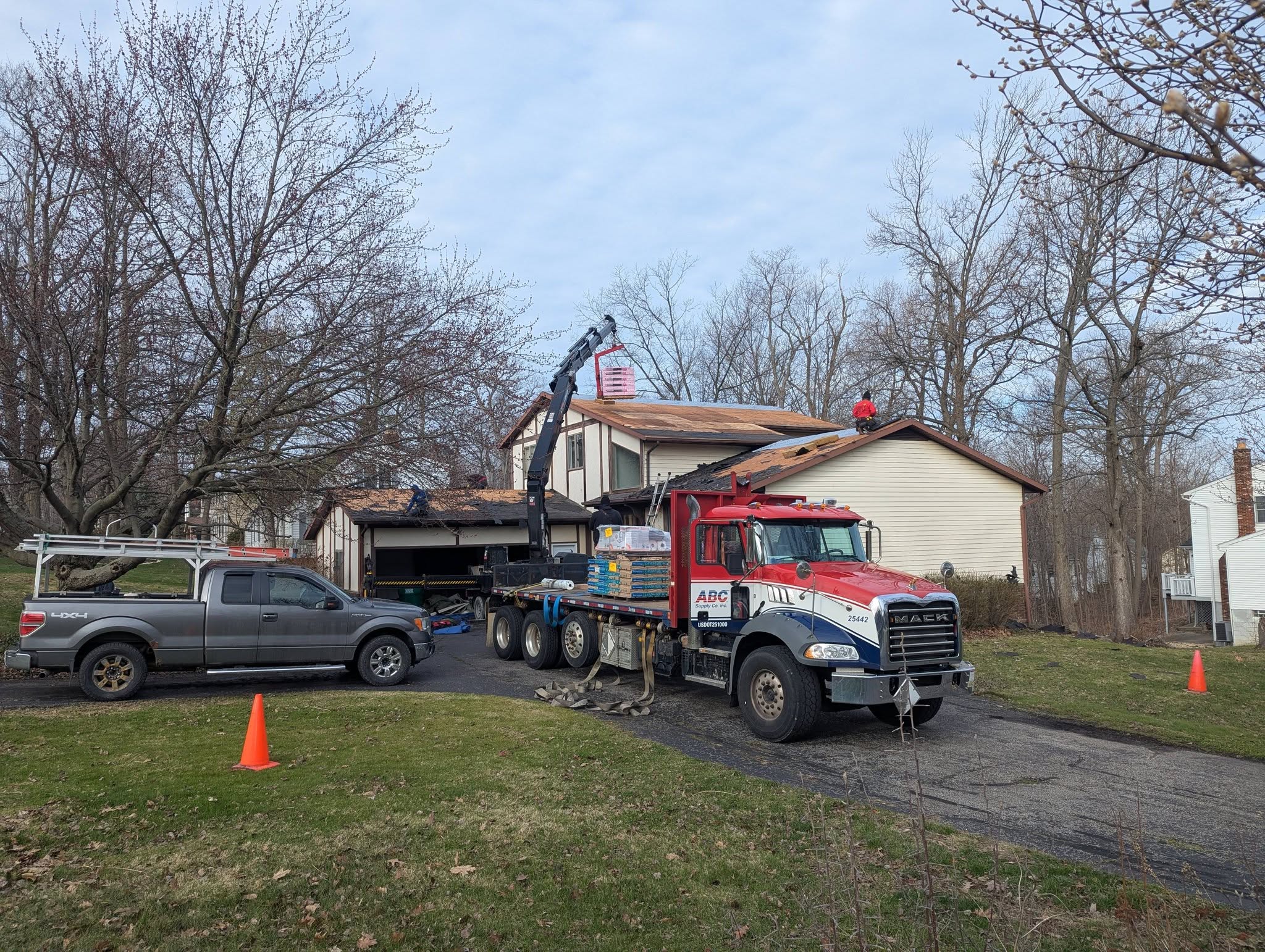 Kingpin roofer repairing storm damage on a Northeast Ohio roof