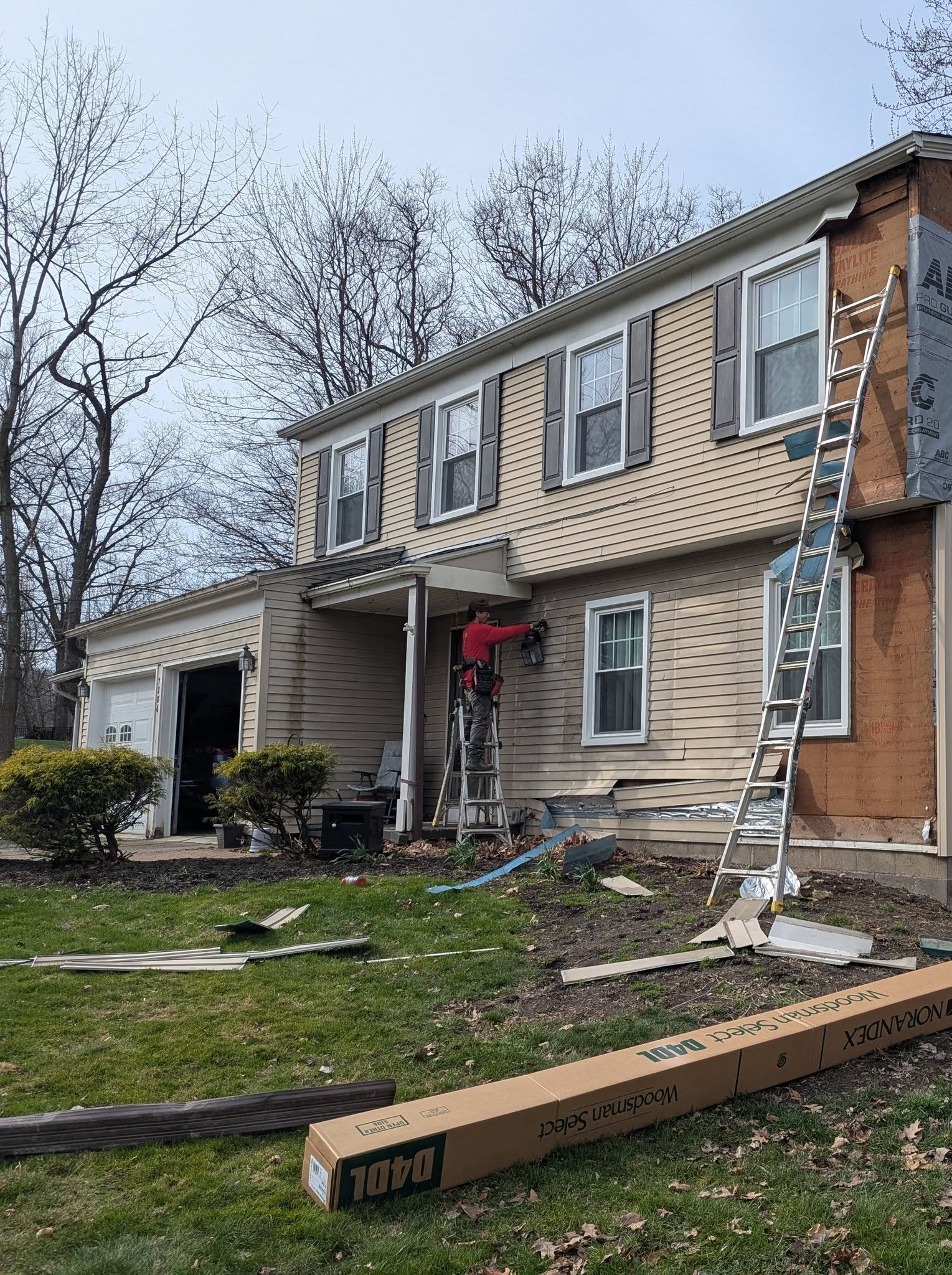 Kingpin roofer repairing storm damage on a Northeast Ohio roof