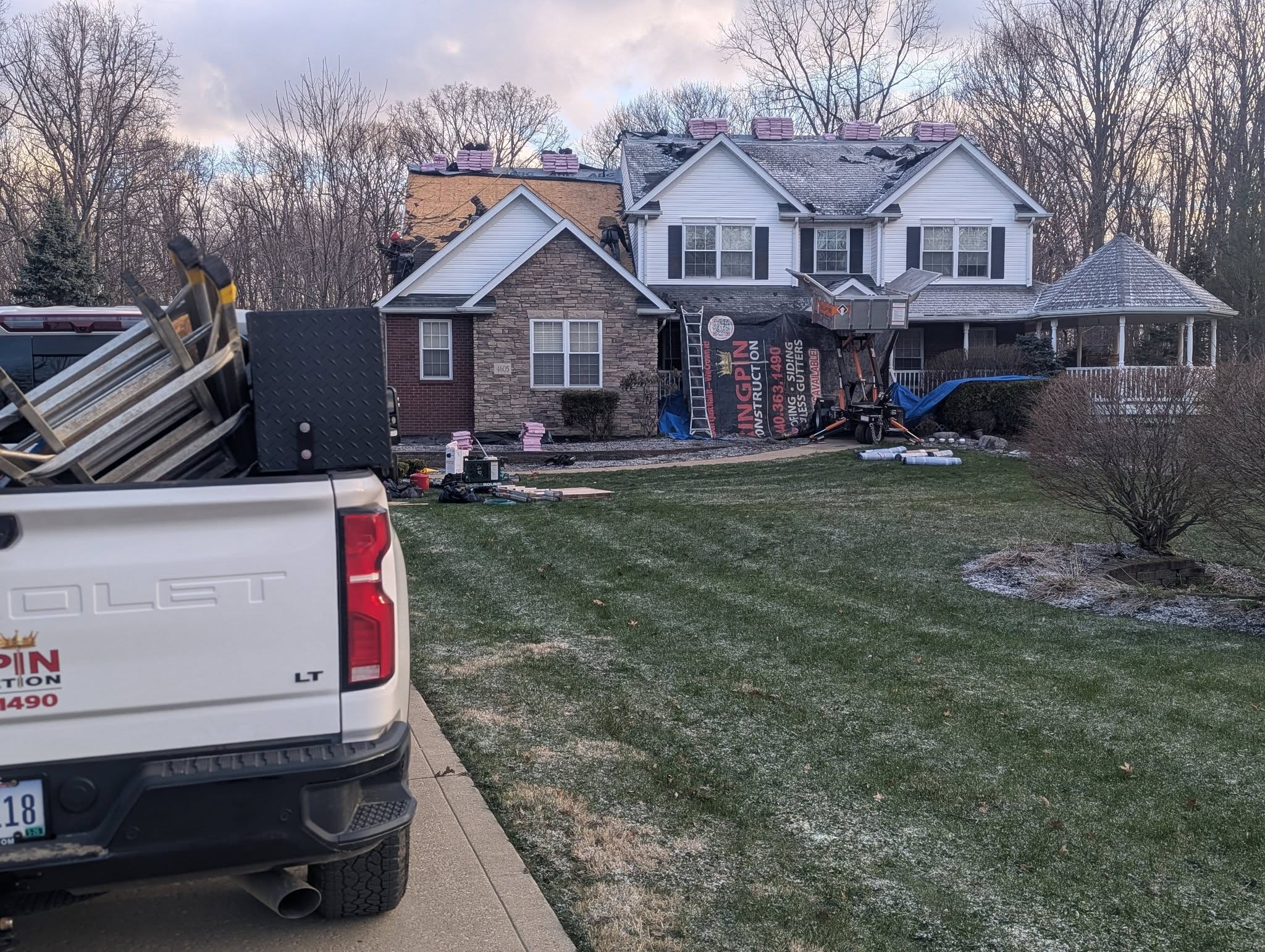 Kingpin roofer repairing storm damage on a Northeast Ohio roof