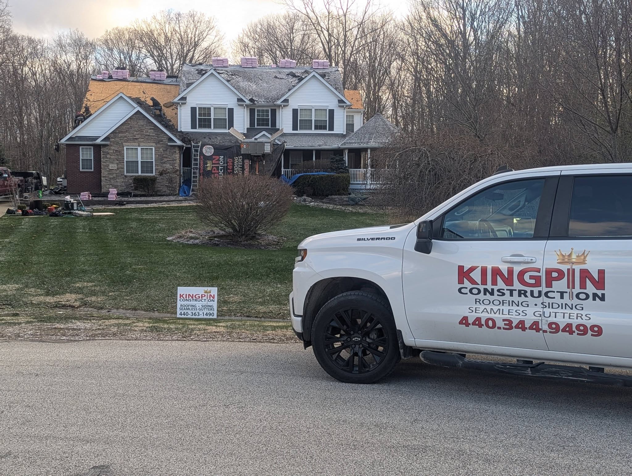 Kingpin roofer repairing storm damage on a Northeast Ohio roof