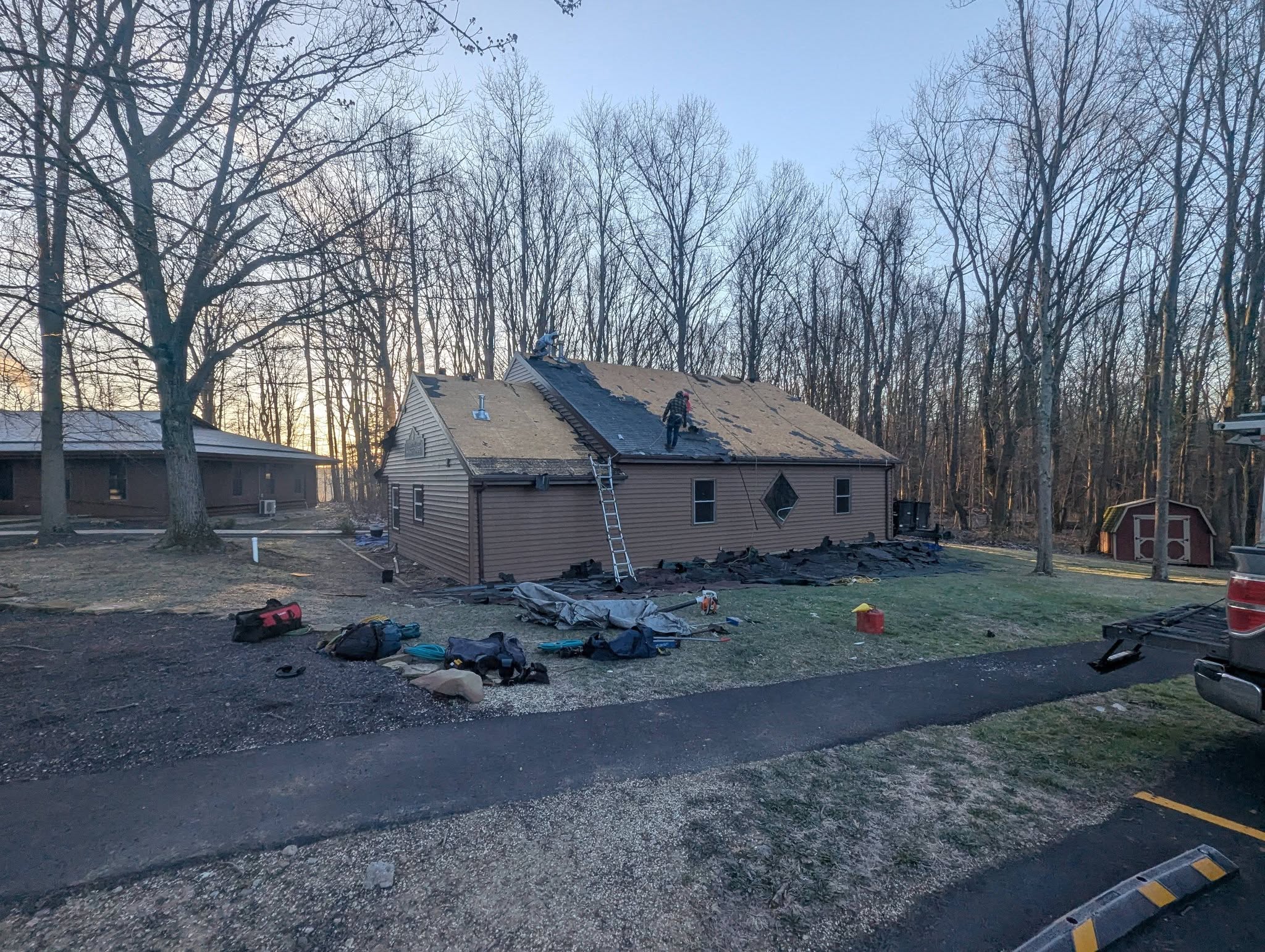 Kingpin roofer repairing storm damage on a Northeast Ohio roof