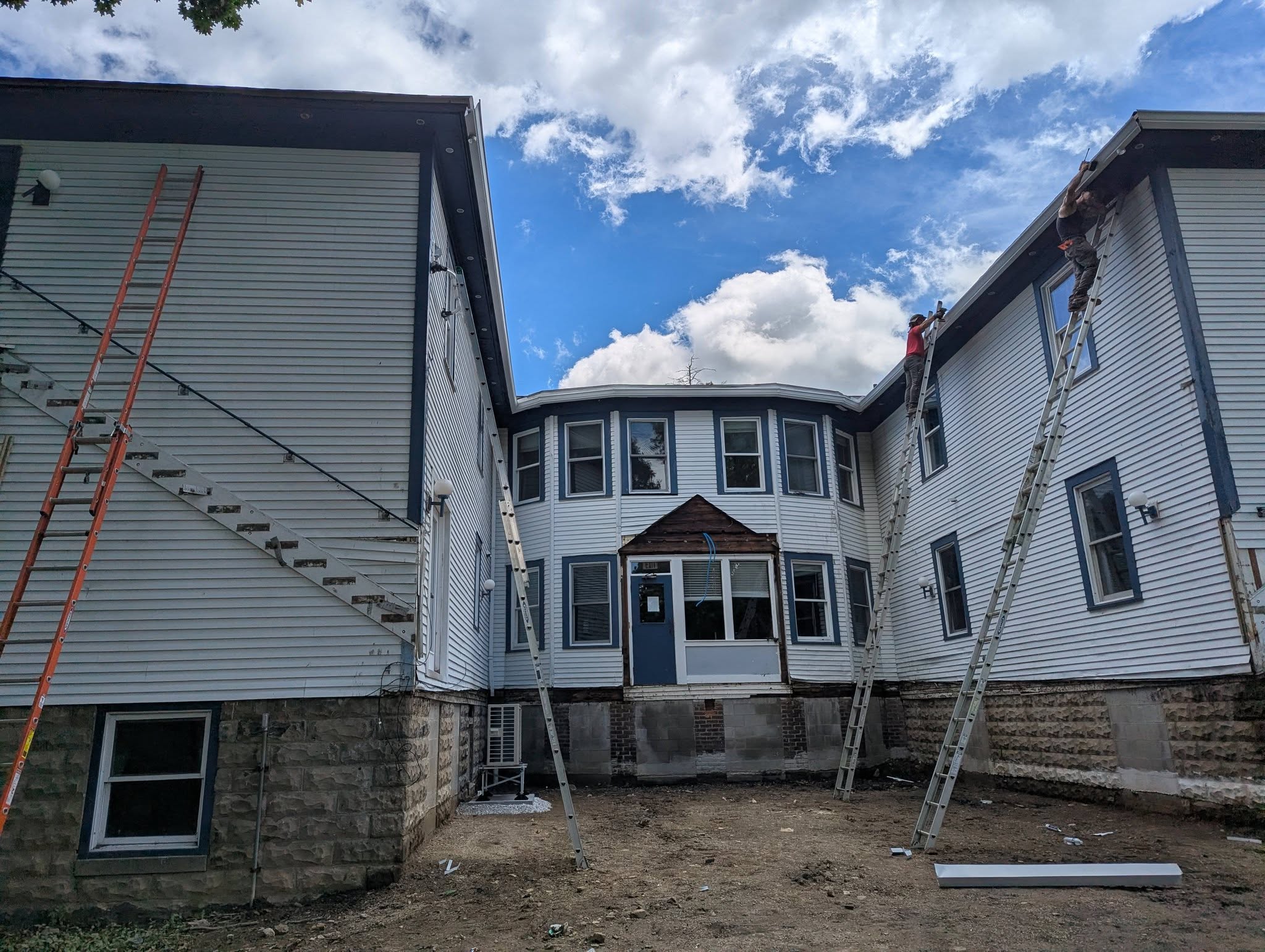 Kingpin roofer repairing storm damage on a Northeast Ohio roof