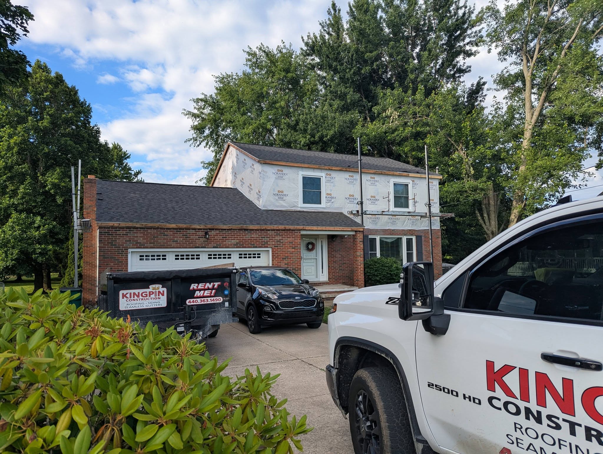 Kingpin Construction crew at work on a Northeast Ohio roof