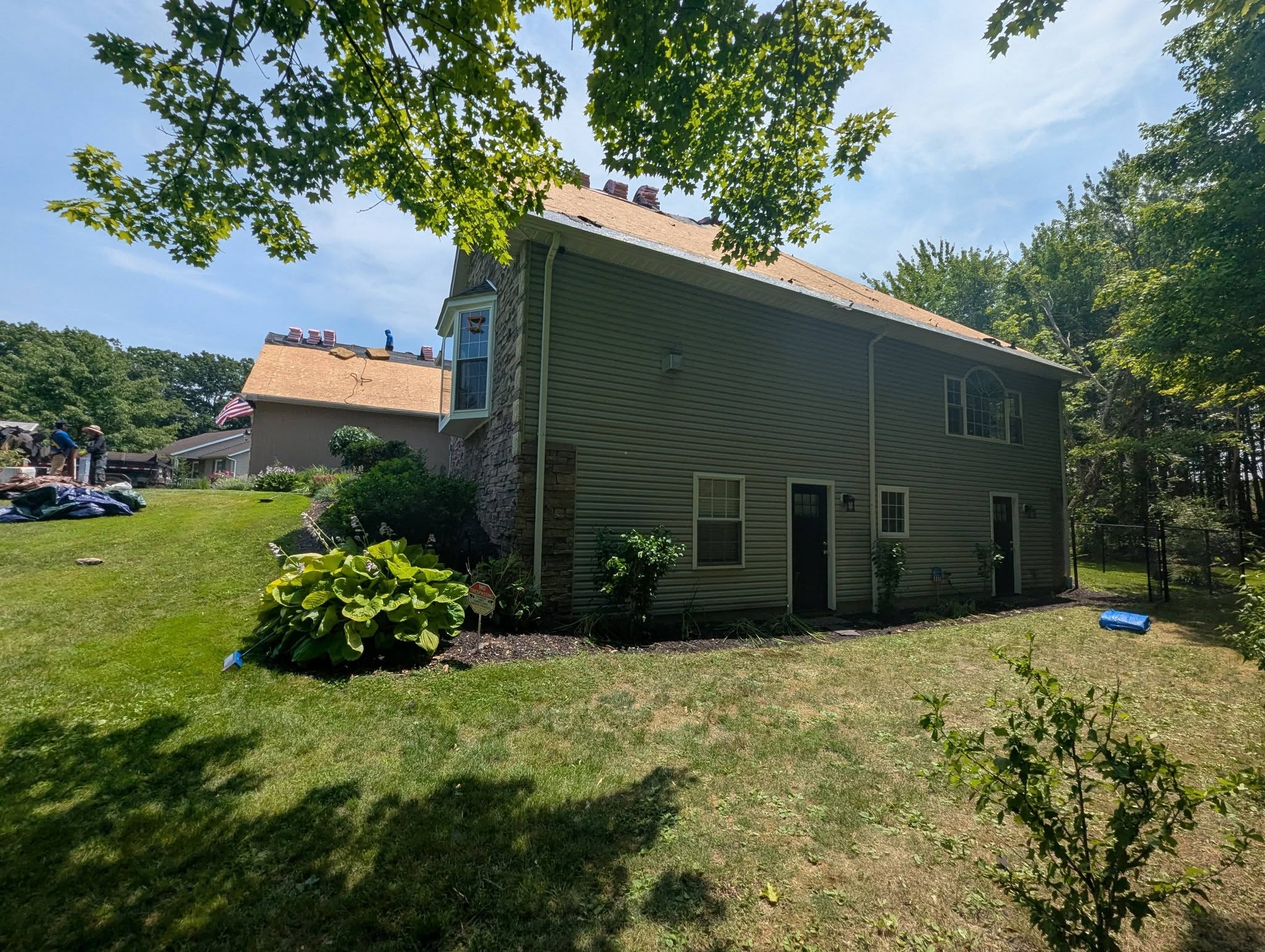 Kingpin Construction crew at work on a Northeast Ohio roof